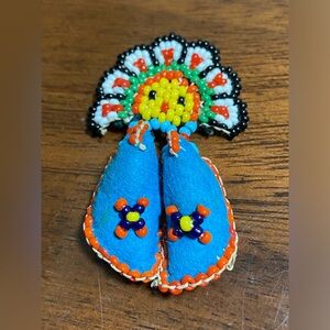 Vintage And Sweet Native American Hand Made Sun Face and Dangling Moccasins